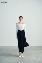 Off-shoulder fitted top with long sleeves and minimalist neckline for modern sophistication